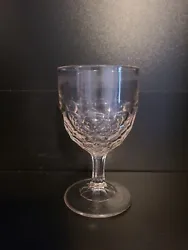 Enjoy a touch of vintage elegance with this antique EAPG clear glass honeycomb water goblet. The intricate honeycomb...