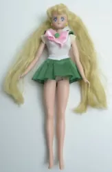 Not sure if this clothes with this specific doll or not. One of her hair scrunchies is missing.
