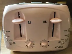 This rare Cooks toaster in a beautiful pink color is perfect for anyone who loves bagels or bread. With four wide...