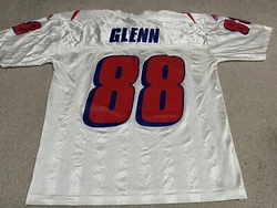 Show your love for the New England Patriots with this vintage Terry Glenn football jersey. Made by Adidas, this mens...