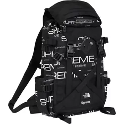 Water resistant 1200D poly 840D ballistic nylon with printed logo pattern. Pouch pockets at sides with adjustable.