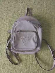 Guess Mini Leather Backpack. Never used  small knick at corner