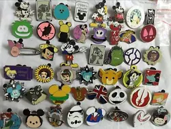 These pins are all official Disney pins. Lot of 25 Mix Assorted Random No Doubles Disney Pins. The pictures show the...