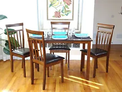 Use 5-Piece Dining Set in your dining room or kitchen to add elegance to your dining area. It seats 4 people...