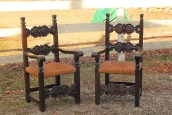 Pair of Spanish mission style armchairs with early mortise and tenon joinery and real rush seats. Each chair has been...