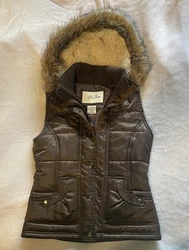 This beautiful vest is in like new condition. Smoke free home, same day shipping.