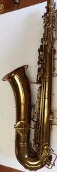Bears serial number 125233 and is marked Low Pitch below the serial number. The saxophone appears to be in very good...