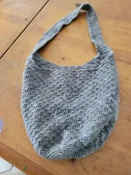 This Crocheted Hobo Bag is handmade and is big enough to carry so many things.  It is a dark gray so it will go with...