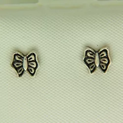Sterling silver earrings with friction backs. 6.4 mm wide.