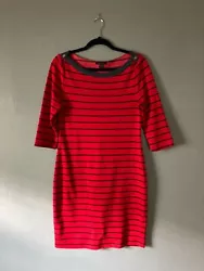 Comfortable and timeless Tommy Hilfiger red & navy striped dress with a boat neck collar & decorative buttons on ends,...