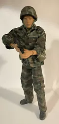 This is a custom figure or a kit bash, meaning the accessories and clothing are not original to this figure and some...
