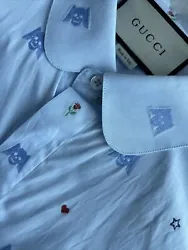 GUCCI MENS FLYING SKULLS, HEARTS, ROSES, #25s, and STARS, BLUE BUTTON DOWN FRONT DRESS SHIRT SIZE 16 1/2 42. NEW WITH...