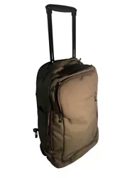 This vintage Patagonia rolling backpack is a must-have for any avid traveler. With its sleek design, its perfect for...