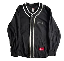 This Supreme baseball jersey is a must-have for any fan of the brand. With a long sleeve design and a sleek black...