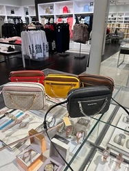 Powder Blush Multicolor. Material: Leather or PVC(MK Signature). Interior: Two slip-in pockets for organization. It is...