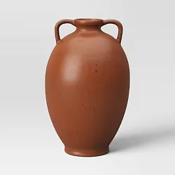 •Medium ceramic vase •Rust finish with black speckles •Watertight construction •Tabletop placement •Spot or...
