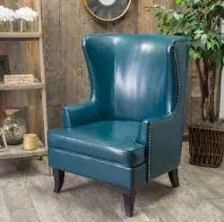 Leather Wingback Chair Teal Armchair. Beautiful high back armchair. Stunning high back armchair. Silver nail head trim....