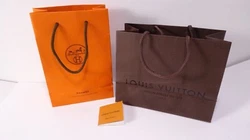 Louis Vuitton Booklet. Brown Louis Vuitton Paris bag with orange blue booklet. Classic orange and white. We combine all...