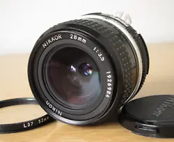 The lens only works in a manual exposure mode. Made in Japan, the lens is in great working condition. The barrel shows...