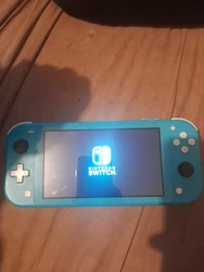Nintendo Switch Lite HS car bloqué sur le Logo Nintendo vendue en létat. Je répète vendue en létat uniquement pas...