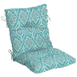 This chair cushion features tufting on top and bottom to give it a custom look and perfectly placed ties to keep it...