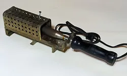 This unique soldering iron from the 1930s is a must-have for any antique tool collector. The brass heating element adds...