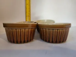 Mid-century ramekin set of 4 brown dishes. 3 of the dishes are in near perfect condition. 1 dish has minor use staining...