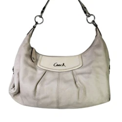 Fair condition. Dinge interior. Leather should bag with patent details and silvertone hardware. Single shoulder strap.