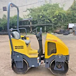 Available for sale is a Wacker Neuson RD12-90 double drum vibratory asphalt roller. gas engine making approx. 20.5 HP -...