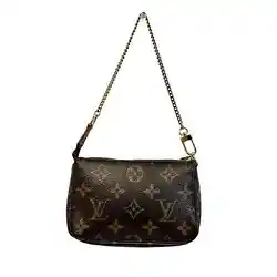 Louis Vuitton Mini Monogram Pochette Excellent preowned condition. •No visible signs of wear on outside leather....