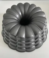 Wilton Retired Belle Bundt Pan. The beautiful design of this cake pan makes it perfect for special occasions or...