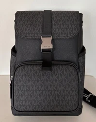 Silver tone hardware. PVC Signature Canvas coated with leather detailed.