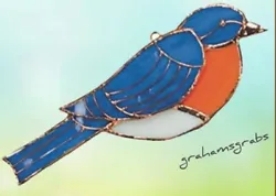 This is the Beautiful Stained Glass Blue Bird Suncatcher by Gift Essentials! The colorful Gift Essentials Blue Bird...