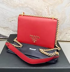 Beautiful authentic Prada Saffiano Soft Calfskin Chain Crossbody Bag in Fuoco. This chic wallet is crafted of Prada...