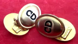 Ancienne paire de boutons de manchette, reliés par une chainette, déco ovale 2,2 x 1,7 cm.