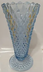 With its unique diamond point pattern and vibrant regal blue color, this vase is sure to catch the eye of any collector...