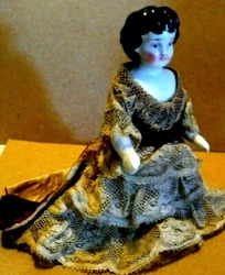 SHE STANDS ON HER OWN - DOLLHOUSE LADY. ABLE TO STAND FLAT BOTTOM BOOTS ANTIQUE DOLL SOLD AS IS--. BLACK HAIR, BLUE...