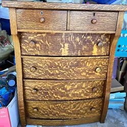 Antique Tiger Stripe Oak Dresser. Condition is Used. Local pickup only.