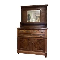 This is a beautiful antique east lake marble top dresser with stunning burl wood and mirror. This dresser dates back to...