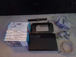 Nintendo Wii U console with all the cords including wii sensor and 11 games including zelda breath of wild