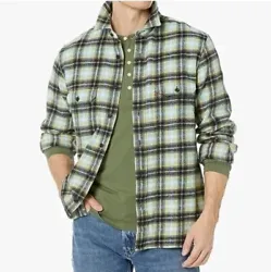 This button-up shirt features a stylish plaid pattern and a comfortable relaxed fit. Its button-down collar and long...