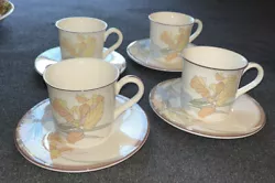 8 Pieces - 4 mugs and 4 saucers - all in great shape.