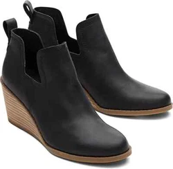 The Kallie—a classic wedge with an uncommon cutout. Dress it up, dress it down, wear it season after season....