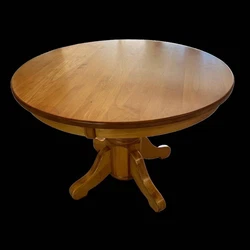 ROUND OAK DINING ROOM TABLE. Condition is Used. Local pickup only.