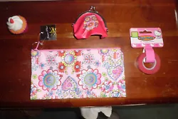 YOU GET 1 FLOWERY COLORED ZIPPERED PENCIL POUCH/CASE WITH A CHANGE PURSE, 1 ROLL OF HELLO KITTY TAPE AND A CUPCAKE...