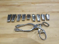 In great conditionCodman Surgical Orthopedic Cervical Retractor Set # 5. Includes 9 blades.