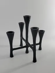 This Stylish Black Metal 5-holder Candelabra with fluted tops is so fun, simple, pretty. Measures 8