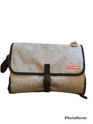 Skip *Hop Travel Diaper Changing Kit. Multiple pockets with red plastic case included for diaper cream, wipes etc. Room...