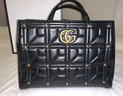 This bag is ideal for any occasion, whether youre going to work or out for a night on the town. This GG Marmont large...