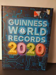 GUINNESS WORLD RECORDS 2020 Hardcover Book. well as cover still pretty good overall (except sticker residue).
